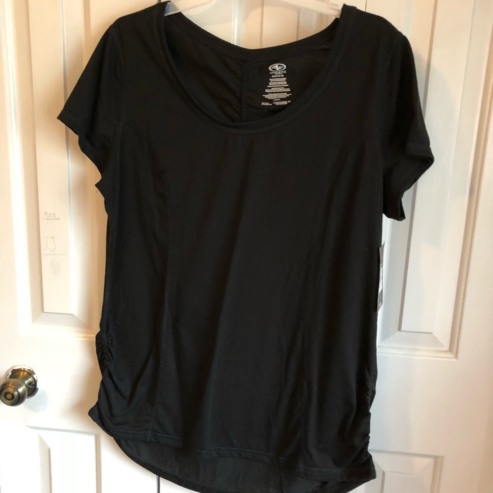Athletic works moisture wicking top. High low hem.